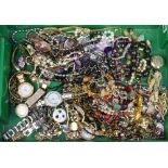 A quantity of costume jewellery and watches