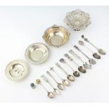 A silver Armada dish London 1976, 1 dish, a tazza, bowl, 11 souvenir spoons and a silver thimble,