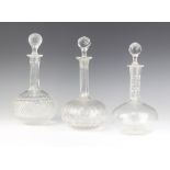 An Edwardian spirit decanter and stopper 26cm and 2 others