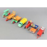 Dinky farming models consisting of a Massey-Harris tractor (27a) with red body and yellow cast