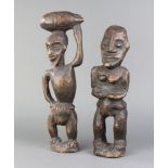 Two African carved wooden tribal figures 37cm x 8cm