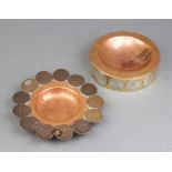 An interesting copper and brass ashtray, the edge inset 13 pre-1947 florins 3.5cm h x 13cm diam.