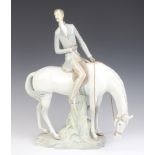 A Lladro figure of a gentleman on horseback 43cm The horse has a restored back left leg. The