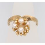 A 9ct yellow gold pearl set ring size L, 3 grams