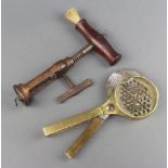A 19th Century metal ratchet corkscrew and a curious brass cutter