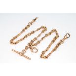 A 9ct rose gold 39cm Albert with T-bar and clasps, 29.5 grams 1 clip on a clasp is missing