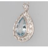 A white gold pear shaped aquamarine and diamond pendant, the centre stone approx. 2ct surrounded