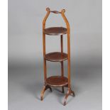 A mahogany circular 3 tier folding cake stand 90cm h x 23cm diam