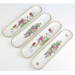 Four modern Dresden rounded rectangular pin trays decorated with flowers 23cm