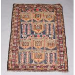 A black and brown ground belouche rug, the centre formed of 12 panels within a 3 row border 126cm