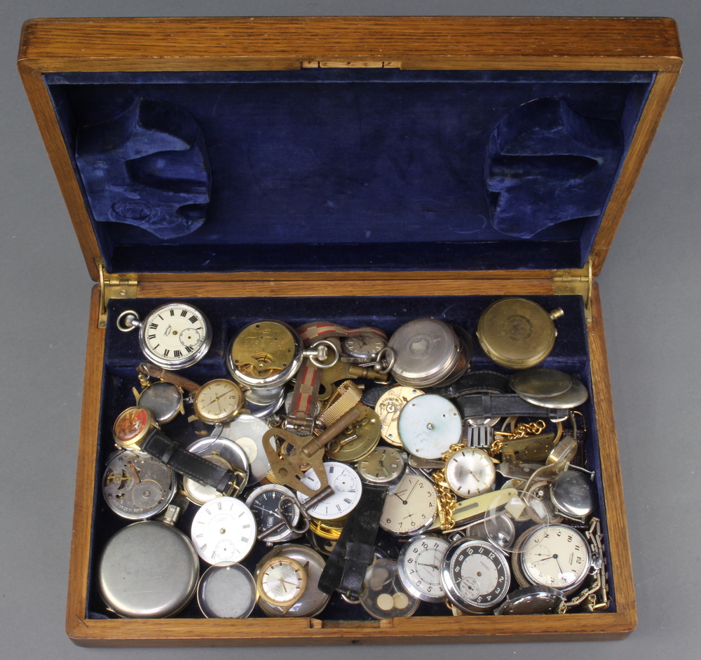 Two silver pocket watch cases, minor pocket watches, wrist watches and parts