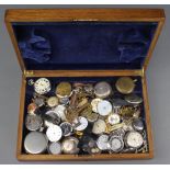 Two silver pocket watch cases, minor pocket watches, wrist watches and parts