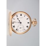 A gentleman's 9ct yellow gold enamelled half hunter pocket watch with seconds at 6 o'clock, the dial