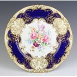 A Staffordshire cabinet plate decorated with spring flowers 17cm