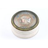 A 19th Century turned ivory trinket box, the lid painted with a cherub 5cm