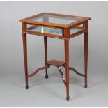 An Edwardian rectangular inlaid mahogany bijouterie table with undertier, raised on square tapered