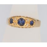 A Victorian 18ct yellow gold sapphire and diamond ring size P 1/2, 3 grams