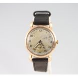 A gentleman's 9ct yellow gold Trebex wristwatch with 36 mm case, on a leather strap