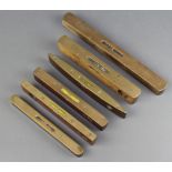 Two J R Bone and Sons brass and mahogany spirit levels, a Wilson Lovatt and Sons mahogany and