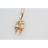 A 14ct 2 colour yellow gold bird pendant and chain 4.1 grams
