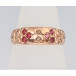 A 9ct rose gold ruby and diamond ring, size P 1/2, 2.5 grams