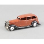Dinky, an uncommon 1946-47 Vauxhall (30d) in black and brown with silver ridged hubs