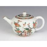 A 19th Century Chinese famille verte bulbous teapot decorated with birds amongst flowering trees 9cm