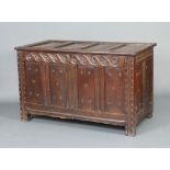 A 17th/18th Century oak coffer of panelled construction with hinged lid 78cm h x 129cm w x 68cm d