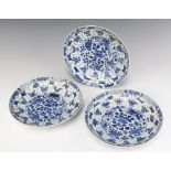 A set of 3 19th Century Chinese shallow dishes decorated with panels of flowers 22cm 2 are cracked