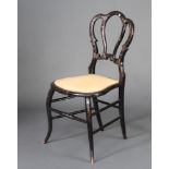 A Victorian inlaid papier mache bedroom chair with tulip shaped back and upholstered seat, raised on