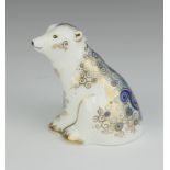 A Royal Crown Derby Imari pattern paperweight of a polar bear cub sitting, gold stopper 7cm