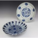 A 19th Century Chinese shallow dish decorated with formal flowers 28cm, a ditto bowl decorated