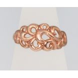 A 9ct rose gold scroll ring, size L, 2.4 grams