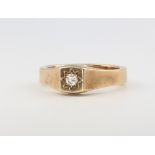 A 9ct yellow gold single stone diamond gents ring, approx. 0.02ct, size U 1/2, 8.2 grams