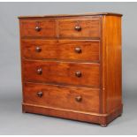 A Victorian mahogany D shaped chest of 2 short and 3 long drawers with tore handles, raised on a