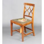 An Edwardian Georgian style inlaid mahogany bar back dining chair with tracery back, Berlin woolwork