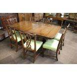 Rackstraw, a Georgian style mahogany dining suite comprising twin pillar extending dining table with