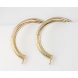 A pair of 9ct yellow gold hoop earrings