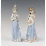 A Lladro figure of a standing girl with bouquet of flowers, impressed 5504 22cm and 1 other girl