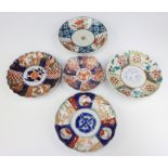 A Japanese Imari plate with lobed body and panel decoration 14cm together with 4 other Imari