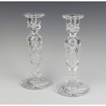 A pair of cut glass candlesticks 22cm