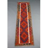 A red and black ground Maimama Kilim runner 202cm x 58cm