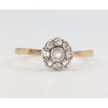 An 18ct yellow gold diamond cluster ring, 2.1 grams, size S 1/2