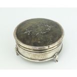 A circular silver and tortoiseshell trinket box with hinged lid, raised on 3 paw feet, Birmingham