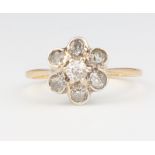 An 18ct yellow gold diamond cluster ring, size O 1/2, 2.2 grams