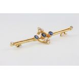 A 15ct yellow gold sapphire and seed pearl bar brooch 2.7 grams, 55mmThe pin is missing