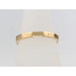 An 18ct yellow gold wedding band, size N, 2.9 grams