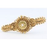 A 15ct yellow gold diamond Etruscan style bar brooch, 6.5 grams