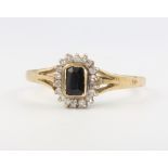 A 9ct yellow gold sapphire and diamond cluster ring 3.3 grams, size Y