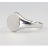 A 9ct white gold signet ring, size X 1/2, 12.1 grams